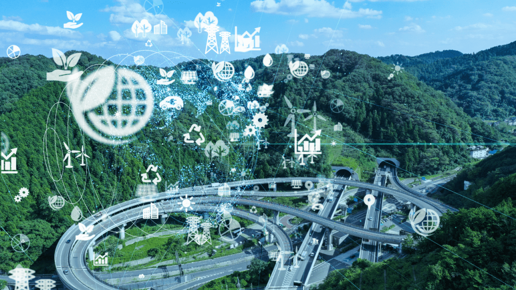 Aérea de um complexo viário entre montanhas arborizadas com ícones transparentes de IA e sustentabilidade (globo, reciclagem, eólica, solar), simbolizando infraestrutura verde e digital.